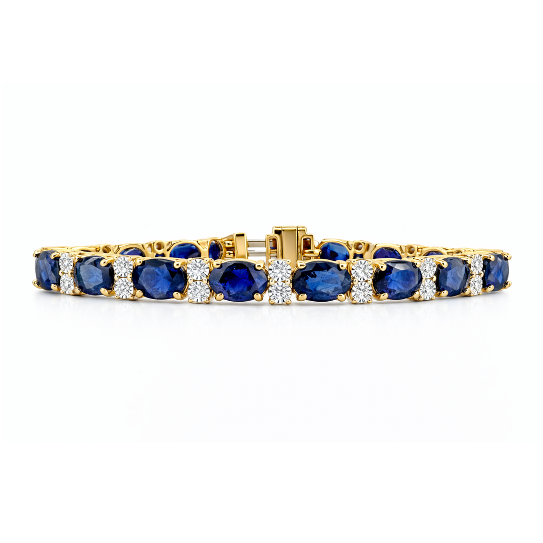 Gold bracelet with blue gemstones and clear stones on a white background