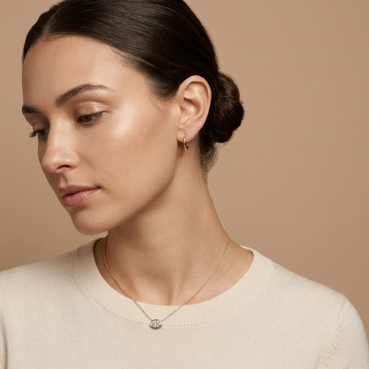 Beautiful oval-cut lab grown diamond bezel-set necklace, adding radiant sparkle to any occasion