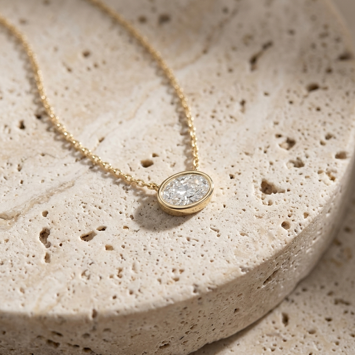 Beautiful oval-cut lab grown diamond bezel-set necklace, adding radiant sparkle to any occasion