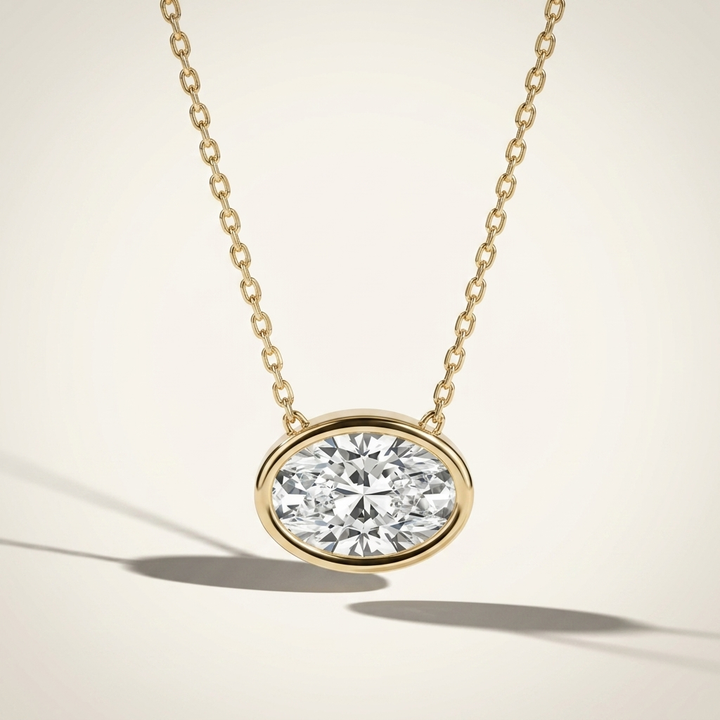 Beautiful oval-cut lab grown diamond bezel-set necklace, adding radiant sparkle to any occasion