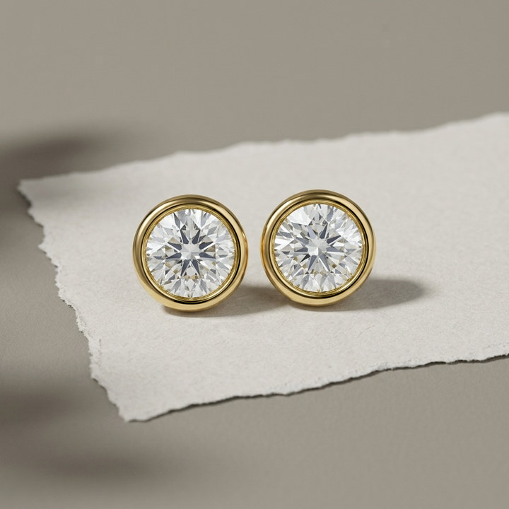 Classic 2.00ctw round-cut lab grown diamond bezel-set stud earrings, a timeless classic for everyday elegance