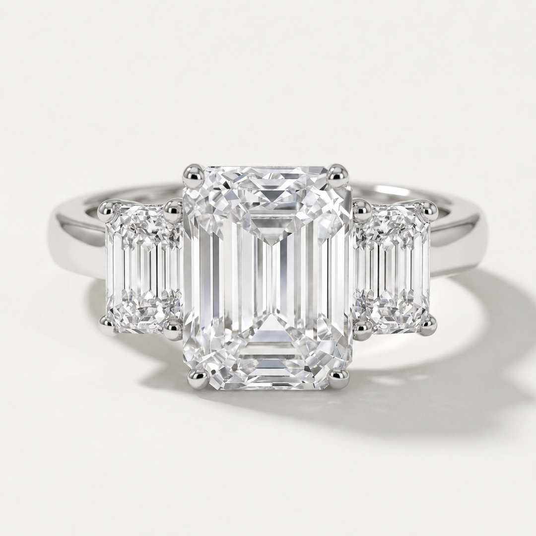 Three stone emerald cut diamond engagement ring, alternate view