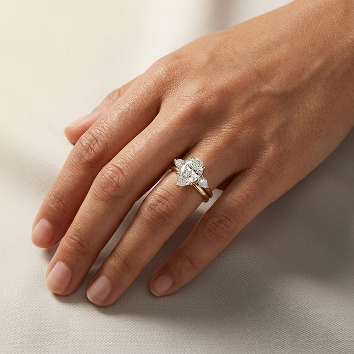Three stone pear diamond engagement ring, additional view