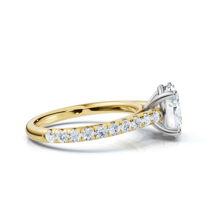 Elegant accented oval cathedral diamond ring, featuring a stunning oval center diamond set in a graceful cathedral setting with sparkling accent diamonds for added brilliance and sophistication.