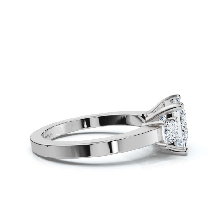 Timeless 3 stone princess diamond ring, featuring a dazzling princess-cut center diamond flanked by two matching princess-cut diamonds, offering a classic and sophisticated design.