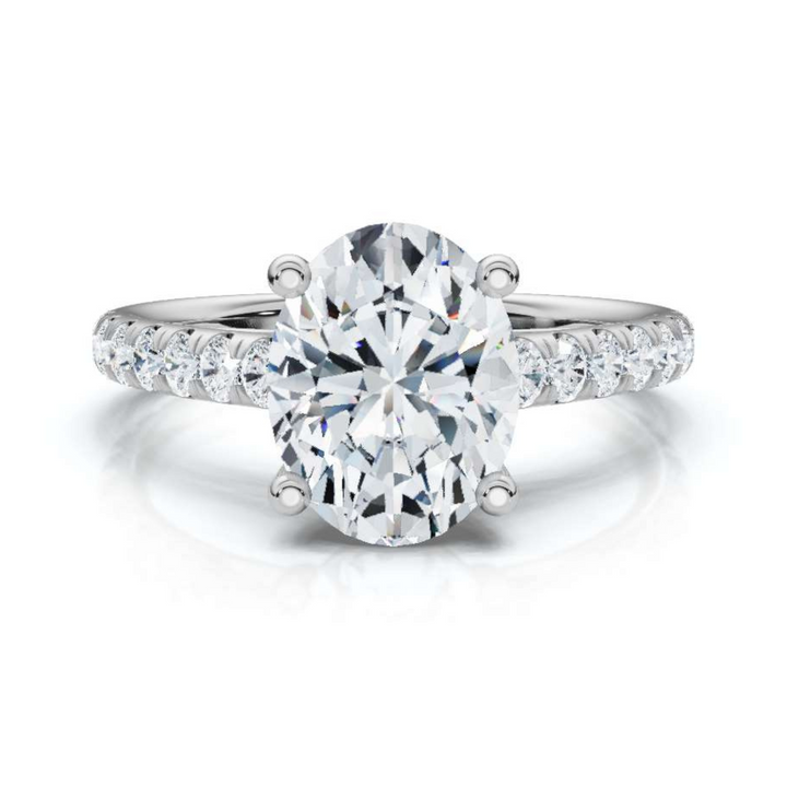 Elegant accented oval cathedral diamond ring, featuring a stunning oval center diamond set in a graceful cathedral setting with sparkling accent diamonds for added brilliance and sophistication.