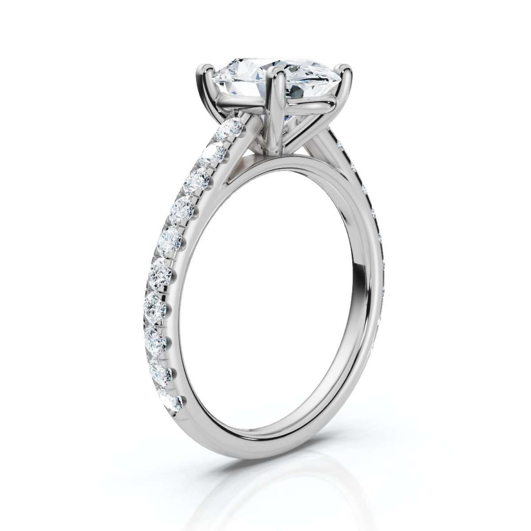 Elegant accented oval cathedral diamond ring, featuring a stunning oval center diamond set in a graceful cathedral setting with sparkling accent diamonds for added brilliance and sophistication.