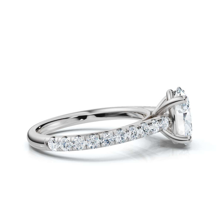 Elegant accented oval cathedral diamond ring, featuring a stunning oval center diamond set in a graceful cathedral setting with sparkling accent diamonds for added brilliance and sophistication.
