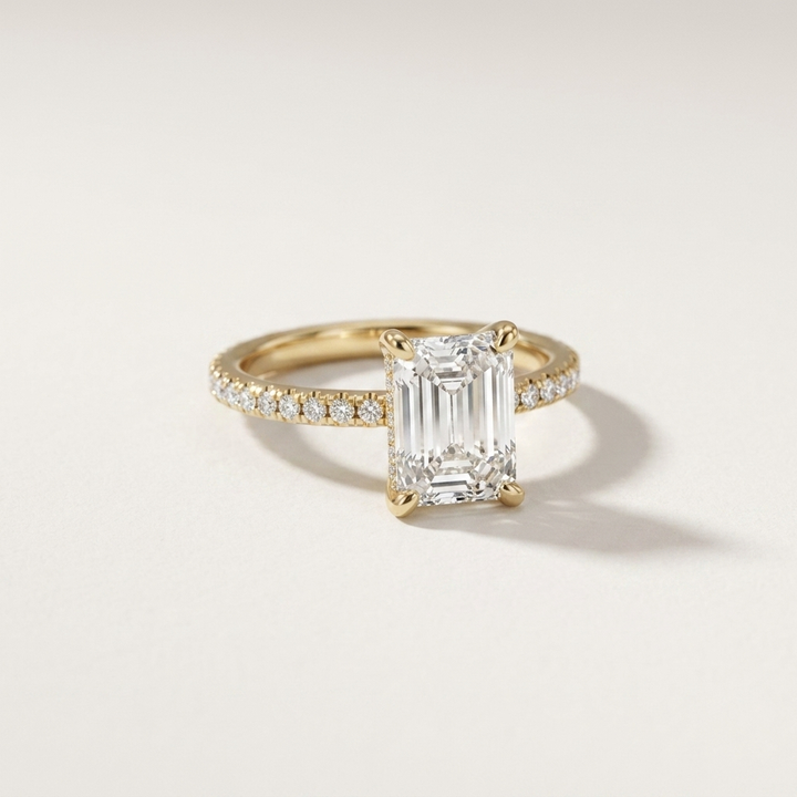 Accented emerald cut diamond engagement ring, detail view