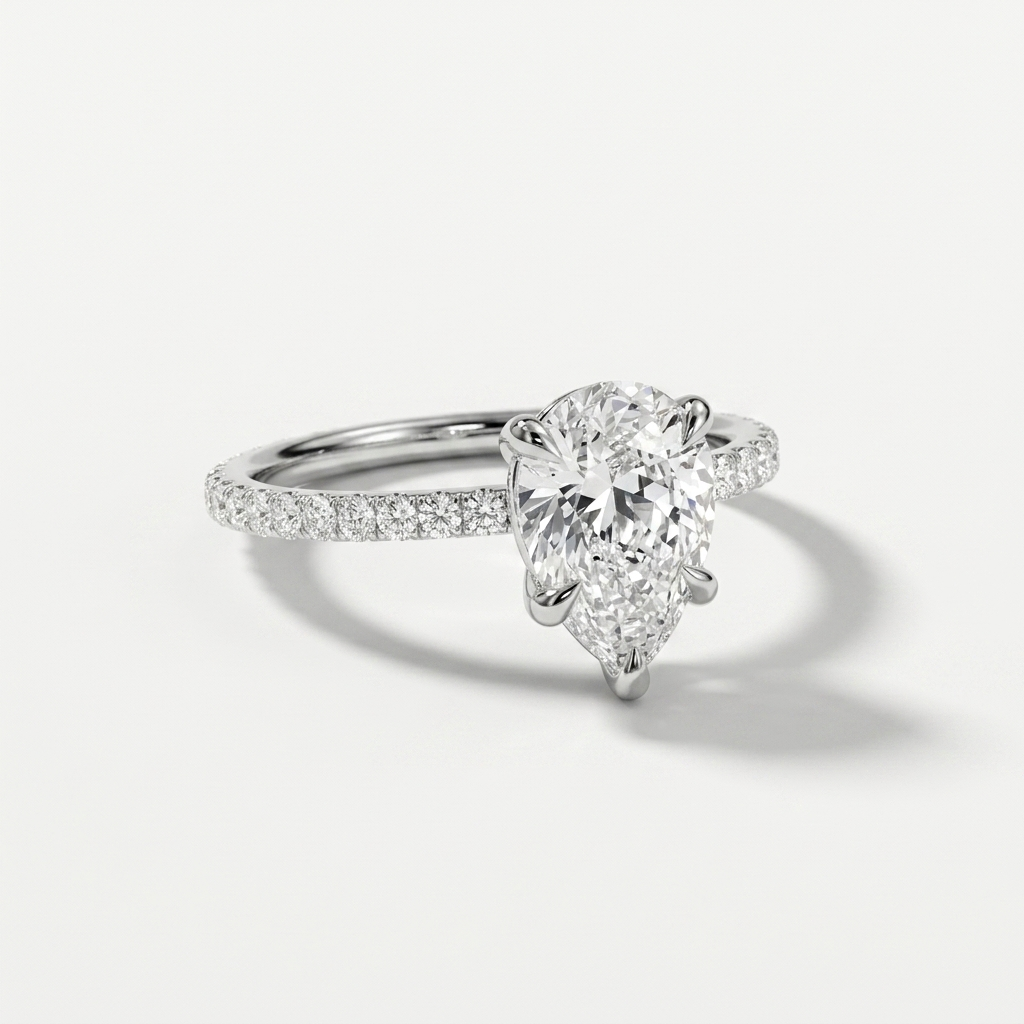 Accented pear diamond engagement ring, detail view