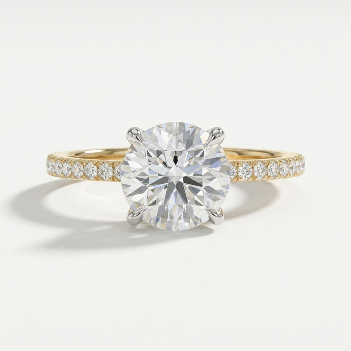 Round diamond engagement ring on a shared prong diamond band