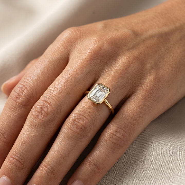 3.00cts Emerald Cut Lab Grown Bezel Set Yellow Gold Ring