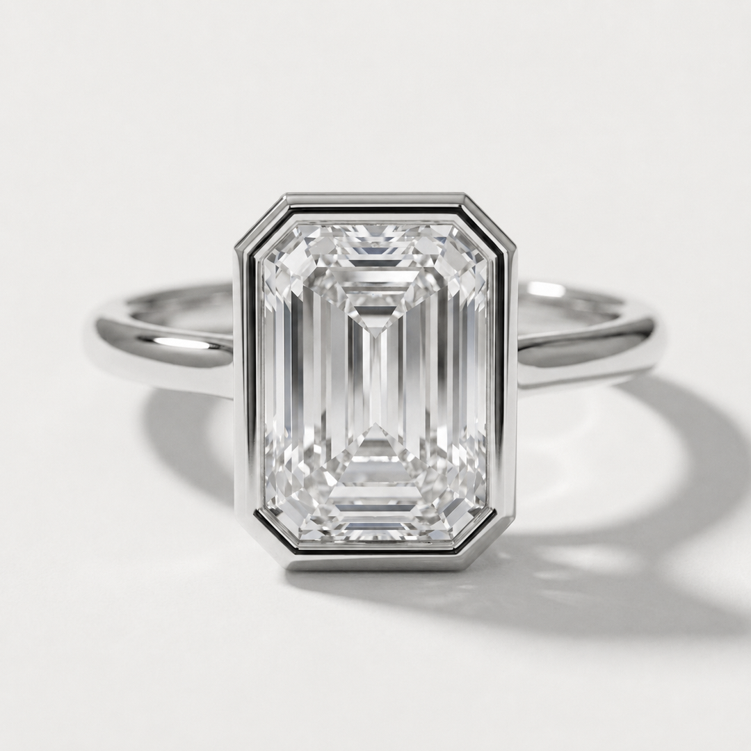 Bezel set emerald cut diamond solitaire ring, alternate view