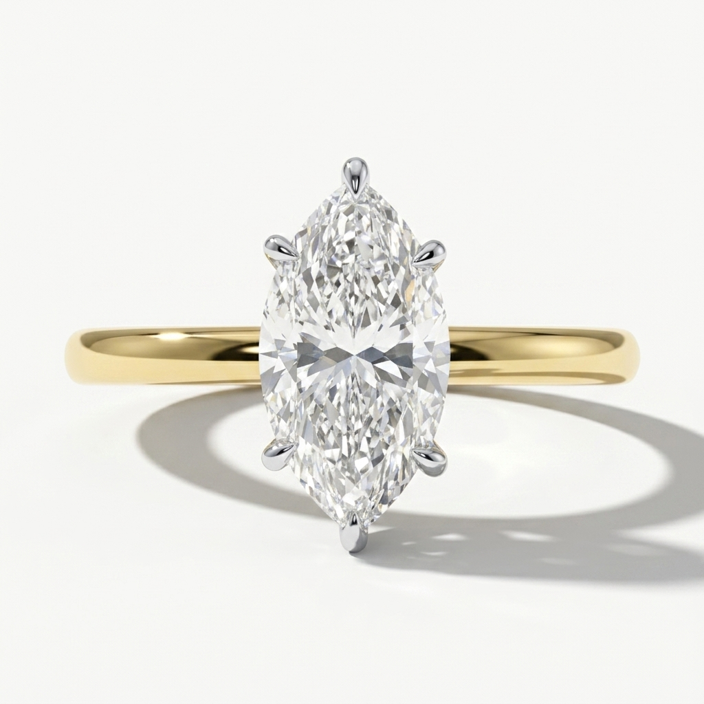 A yellow gold ring with a large marquise-cut diamond center stone, shown on a clean white background with a soft shadow.