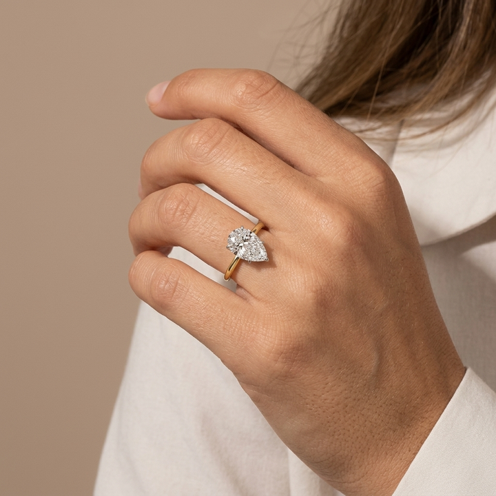 Pear shaped diamond solitaire engagement ring, detail view
