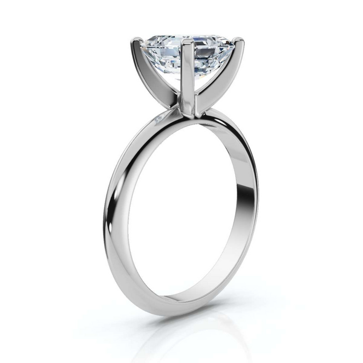 Elegant classic Asscher solitaire diamond ring, featuring a stunning Asscher-cut center diamond set in a timeless four-prong setting, offering a sophisticated and refined design perfect for engagements or special occasions.