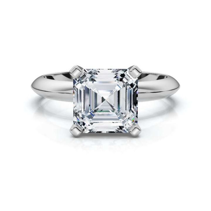 Elegant classic Asscher solitaire diamond ring, featuring a stunning Asscher-cut center diamond set in a timeless four-prong setting, offering a sophisticated and refined design perfect for engagements or special occasions.