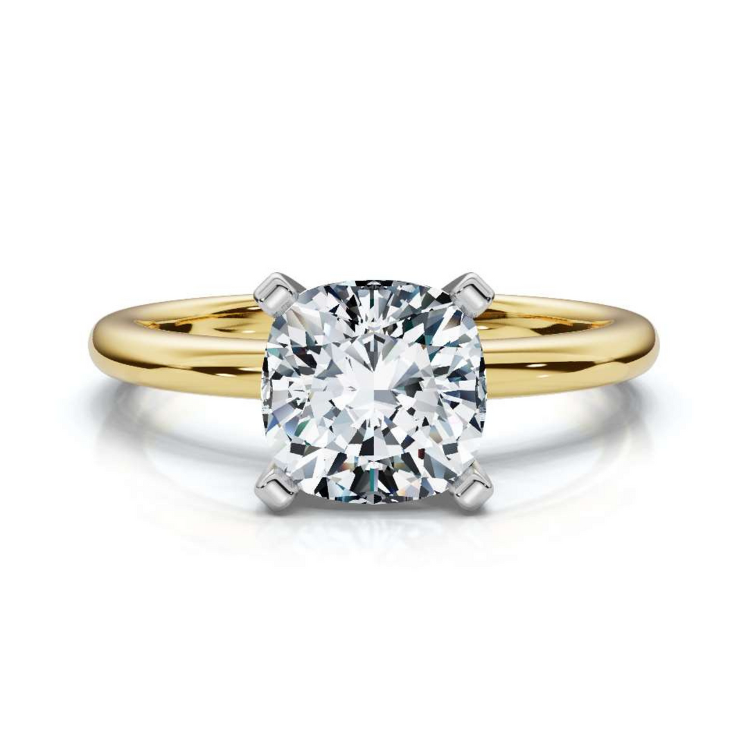 Elegant classic cushion solitaire diamond ring, featuring a stunning cushion-cut center diamond set in a timeless four-prong setting, offering a sophisticated and enduring design perfect for engagements or special moments.