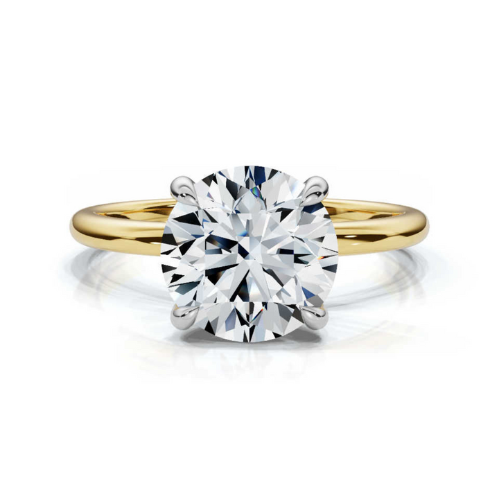 Timeless classic round solitaire ring featuring a brilliant round-cut diamond in a sleek and elegant setting, offering a perfect balance of simplicity and sophistication.