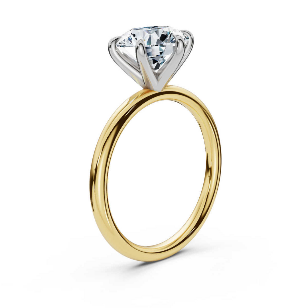 Timeless classic round 6-prong solitaire diamond ring, featuring a brilliant round center diamond securely set in a six-prong setting, offering a sophisticated and elegant design perfect for engagements or special occasions.