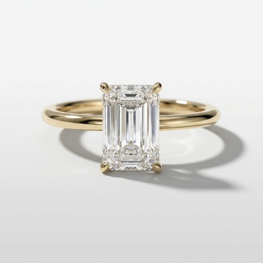 Emerald cut diamond solitaire engagement ring with a hidden halo