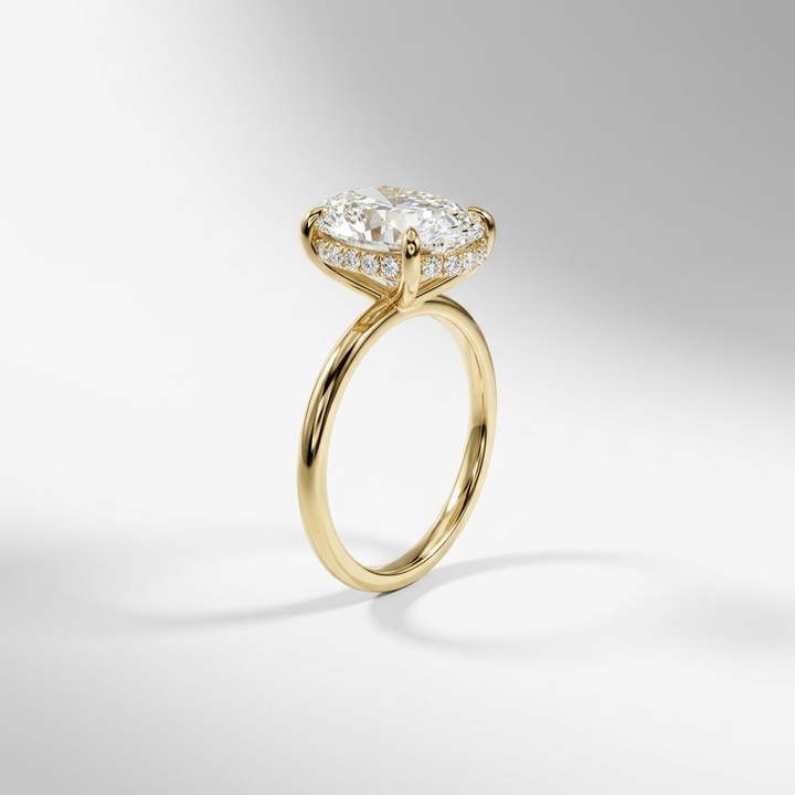 Oval hidden halo solitaire engagement ring, detail view