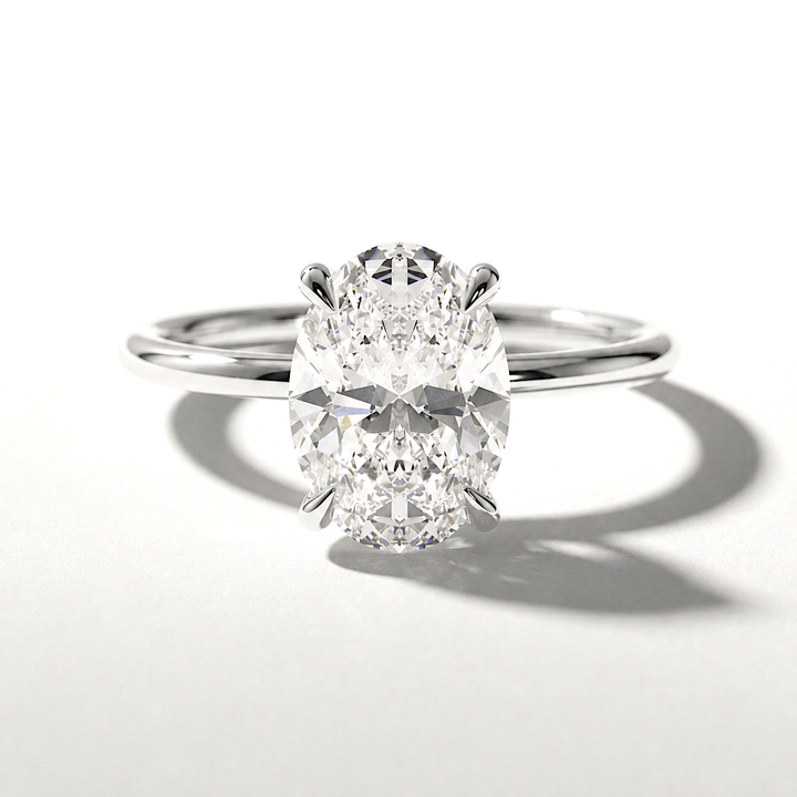 Oval hidden halo solitaire engagement ring, alternate view