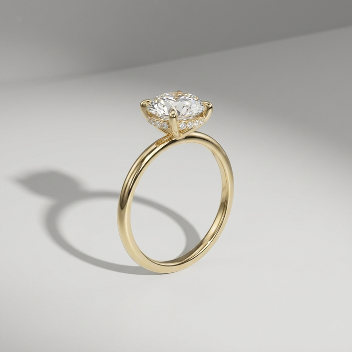 Round hidden halo solitaire engagement ring, detail view