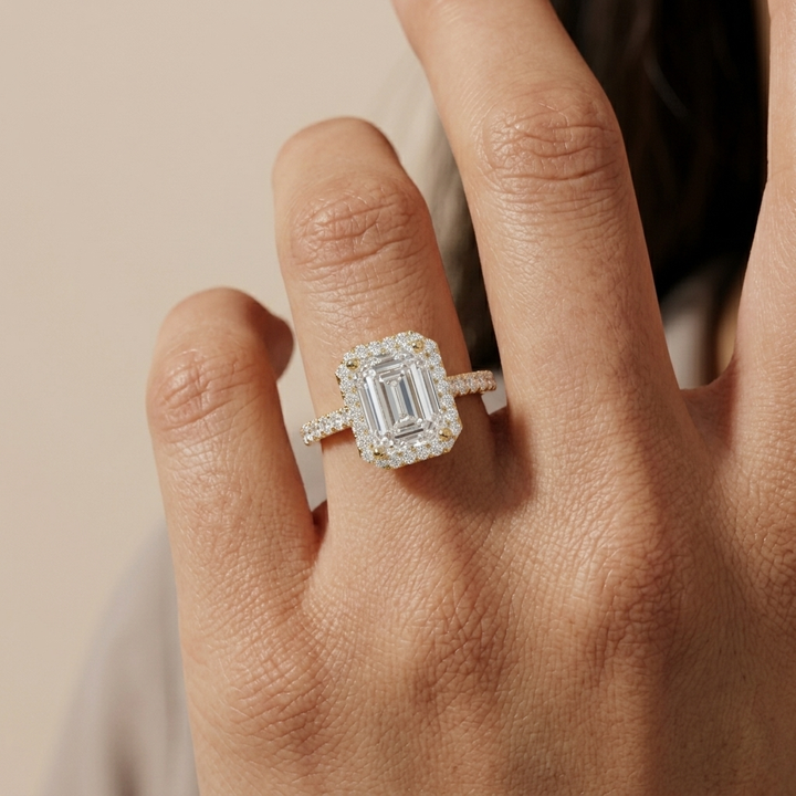 Emerald cut diamond halo engagement ring, detail view