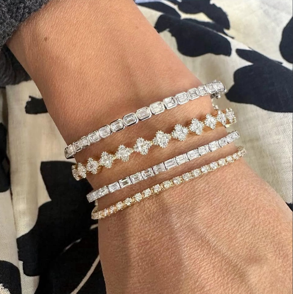 Elegant 2.00ctw diamond baguette bangle featuring a sophisticated design with channel-set diamonds, perfect for adding timeless luxury to any wrist with its refined and sparkling look