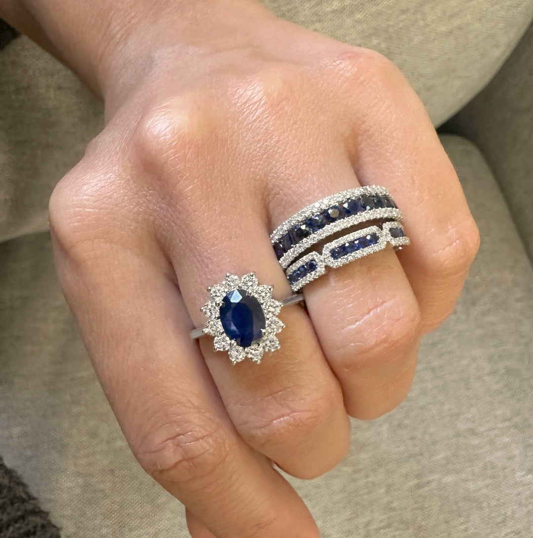 Elegant blue sapphire and diamond ring featuring a stunning deep blue sapphire accented by shimmering diamonds for a timeless and sophisticated look.