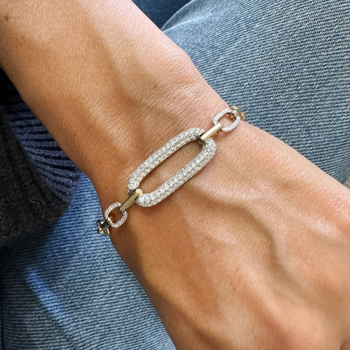 Stunning diamond pavé link bracelet, featuring a series of sparkling pavé-set diamonds on sleek, interlocking links, offering a sophisticated and luxurious design perfect for adding elegance to any wrist.