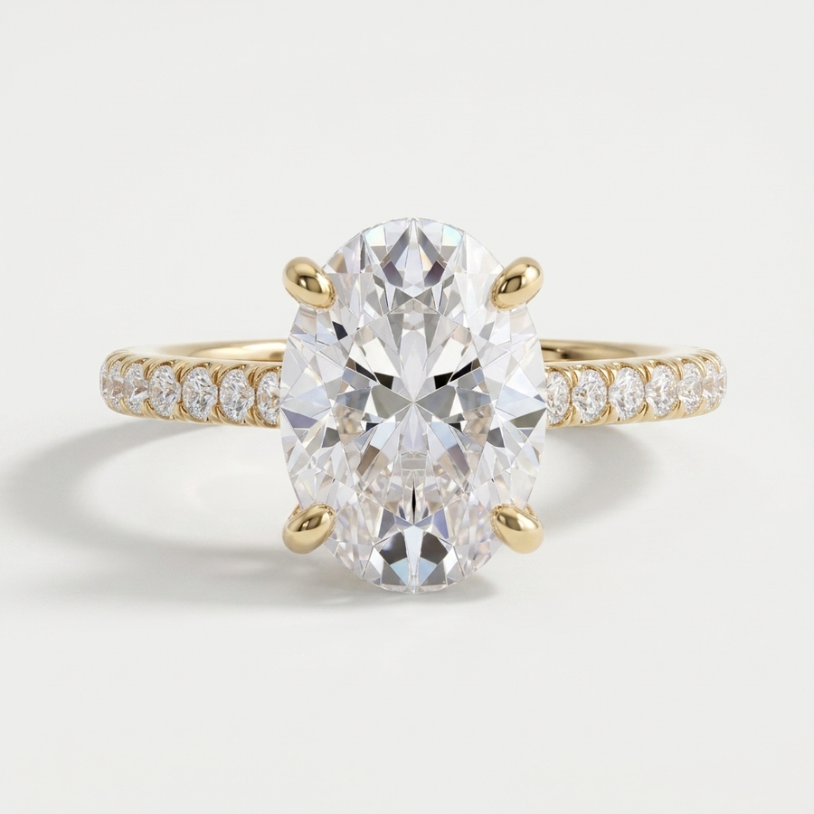 Oval diamond engagement ring on a petite diamond set band
