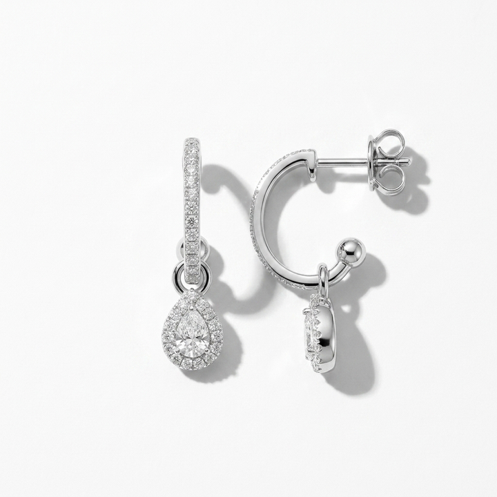 Elegant pear-shaped diamond drop earrings, for a sophisticated and eye-catching look