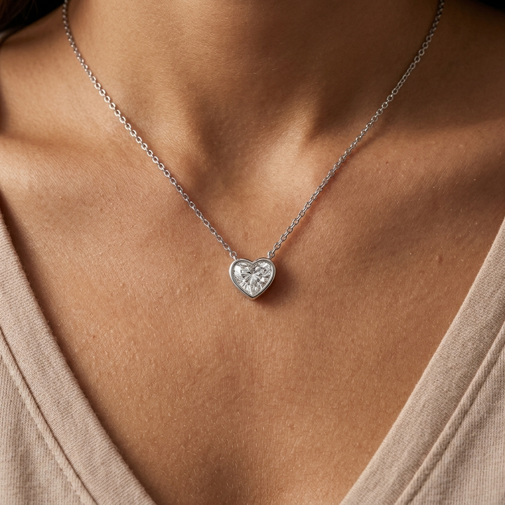 Beautiful heart-shaped lab grown diamond bezel-set necklace, adding radiant sparkle to any occasion