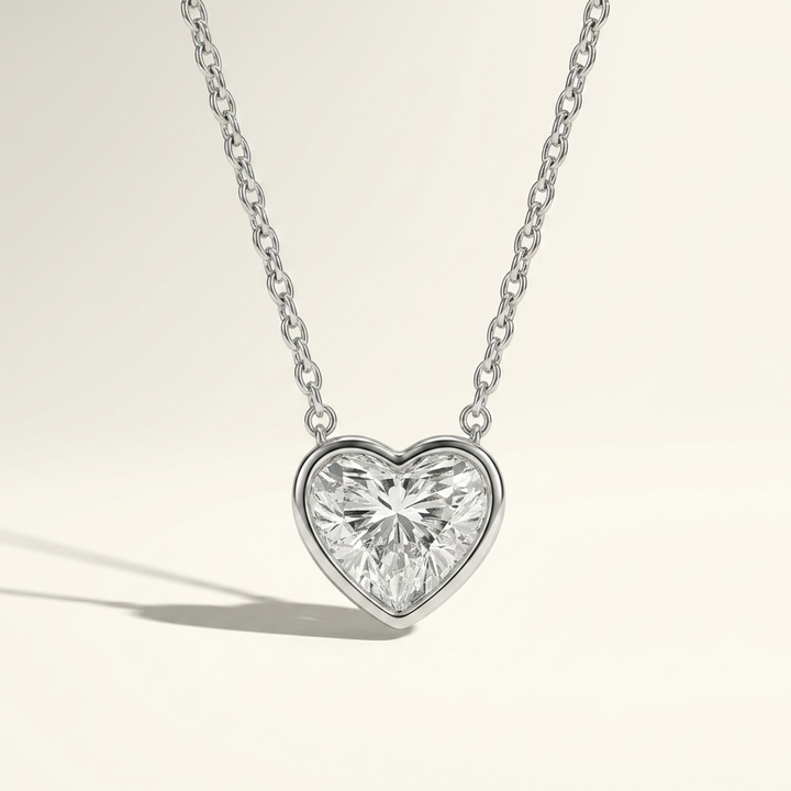Beautiful heart-shaped lab grown diamond bezel-set necklace, adding radiant sparkle to any occasion