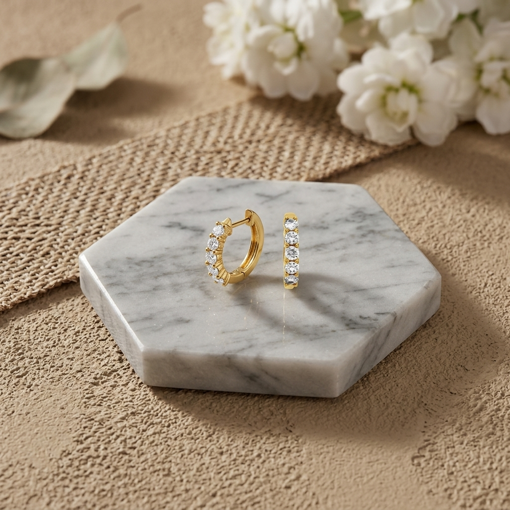 Chic diamond hoop earrings in yellow gold, combining classic style with brilliant sparkle