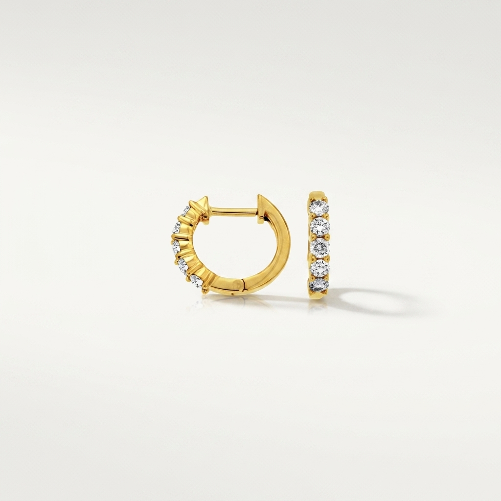 Chic diamond hoop earrings in yellow gold, combining classic style with brilliant sparkle