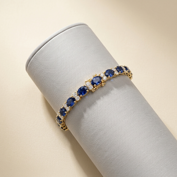 Luxurious oval-cut sapphire and diamond bracelet in yellow gold, a dazzling statement of luxury and refinement
