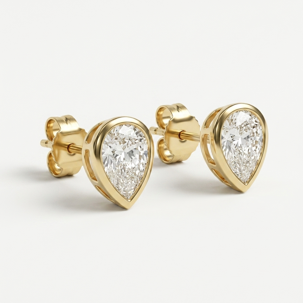 Classic 2.00ctw pear-shaped lab grown diamond bezel-set stud earrings, a timeless classic for everyday elegance