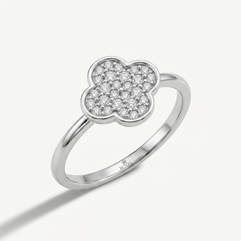 Elegant diamond clover ring in white gold, offering timeless elegance and sophistication
