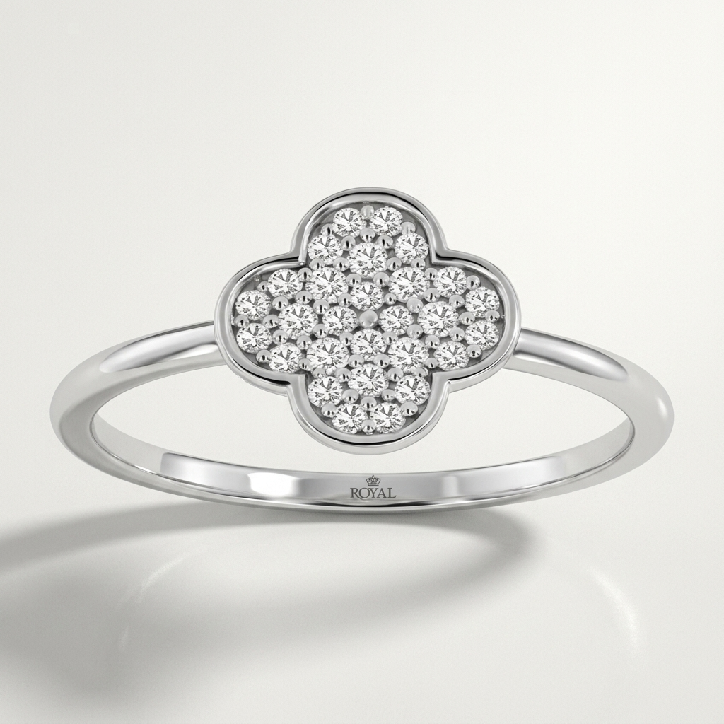 Elegant diamond clover ring in white gold, offering timeless elegance and sophistication