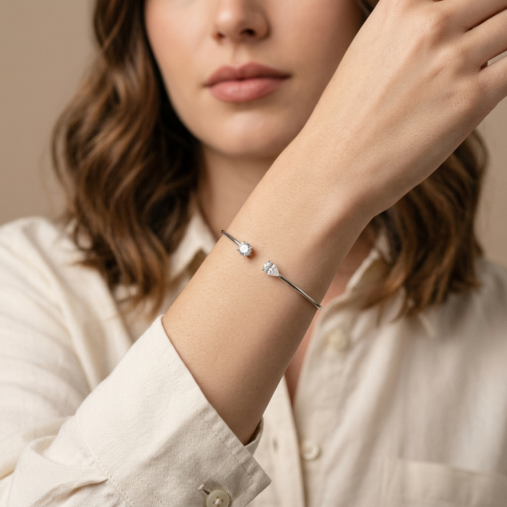 Refined round-cut lab grown diamond bangle in white gold, a sleek and sophisticated accessory for any occasion