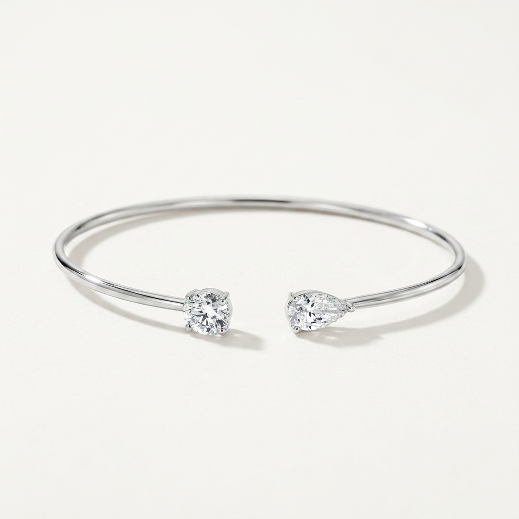 Refined round-cut lab grown diamond bangle in white gold, a sleek and sophisticated accessory for any occasion
