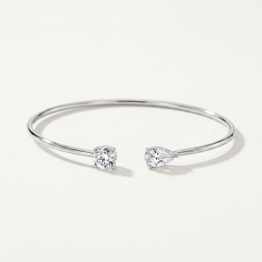 Refined round-cut lab grown diamond bangle in white gold, a sleek and sophisticated accessory for any occasion