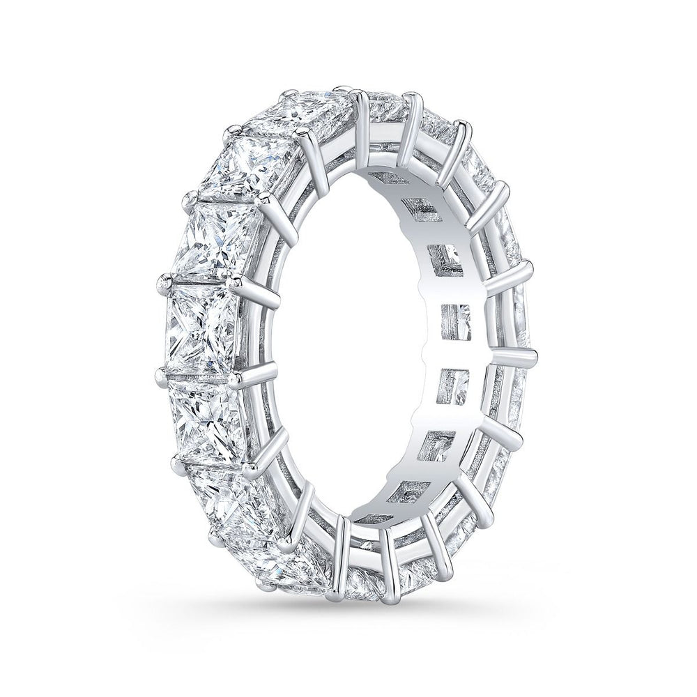 Timeless eternity band featuring princess-cut diamonds in a shared prong setting, offering a seamless row of brilliance and modern elegance.