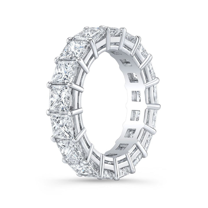 Timeless eternity band featuring princess-cut diamonds in a shared prong setting, offering a seamless row of brilliance and modern elegance.