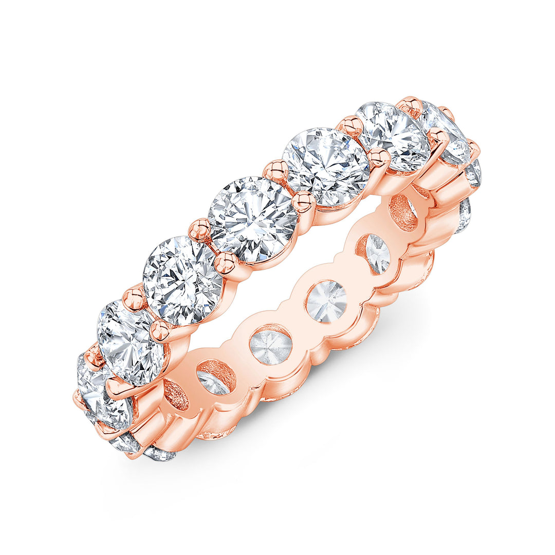 Timeless eternity band featuring round-cut diamonds in a shared prong setting, offering continuous brilliance and classic elegance.