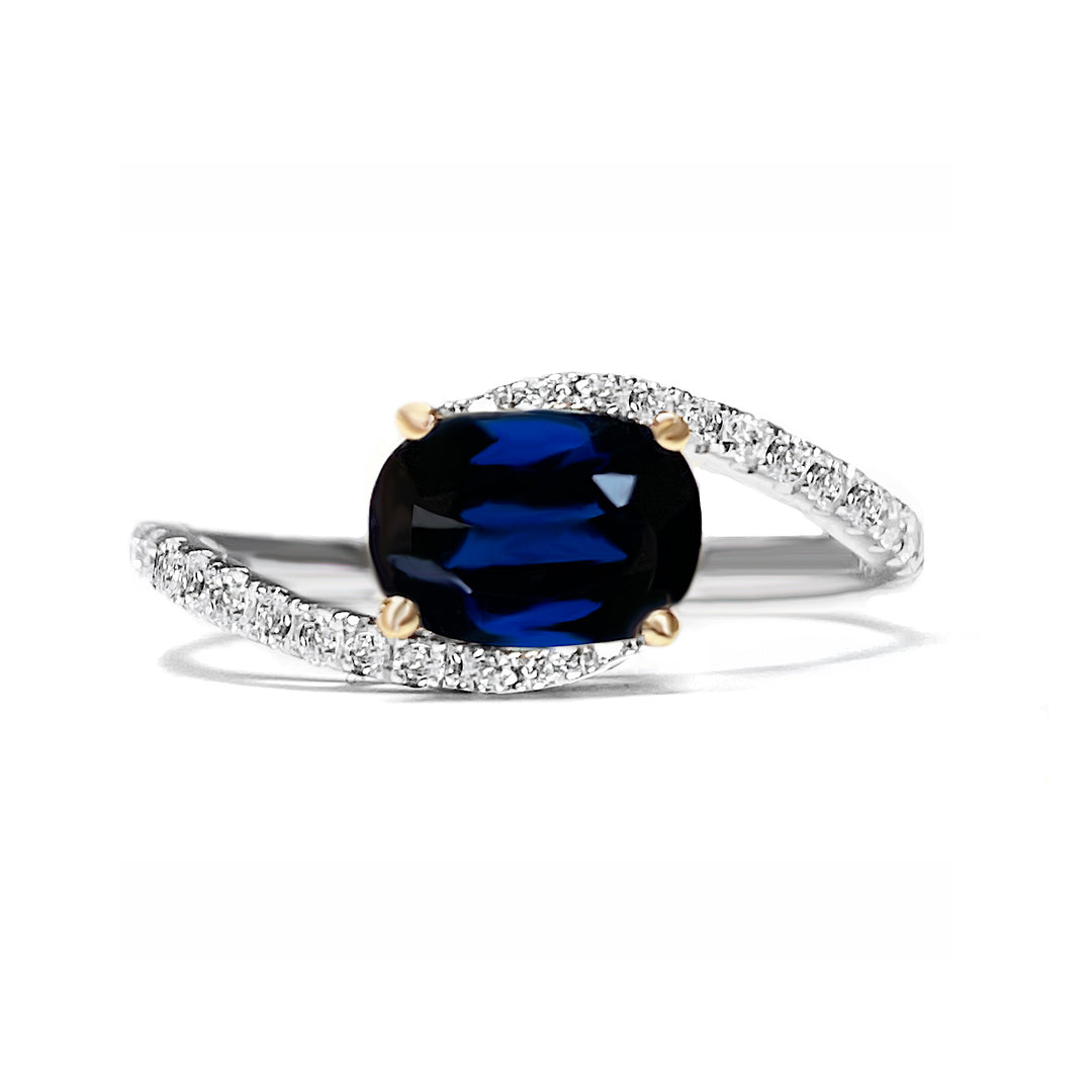 Elegant blue sapphire and diamond ring featuring a rich blue sapphire center stone accented by shimmering diamonds for a timeless and sophisticated design.